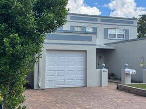 Building Photo - AVAILALBE OCTOBER! Two story Townhouse loc...