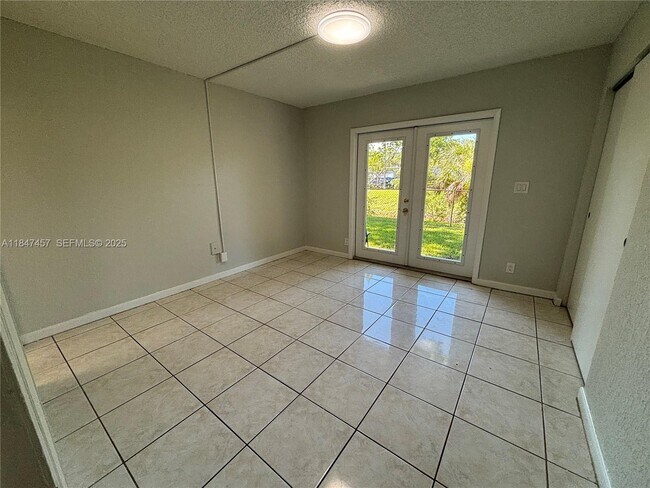 Building Photo - 7921 NW 44th Ct