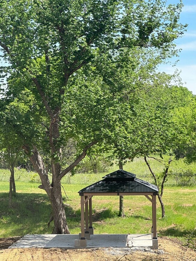 Building Photo - 3/2/2 NO Water Bill -  Fenced Yard - GATED - Peaster ISD -