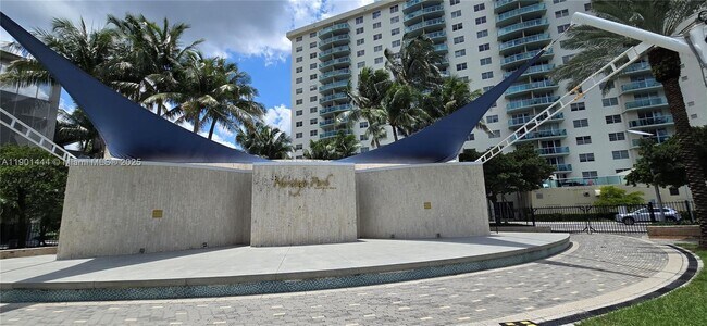 Building Photo - 19390 Collins Ave