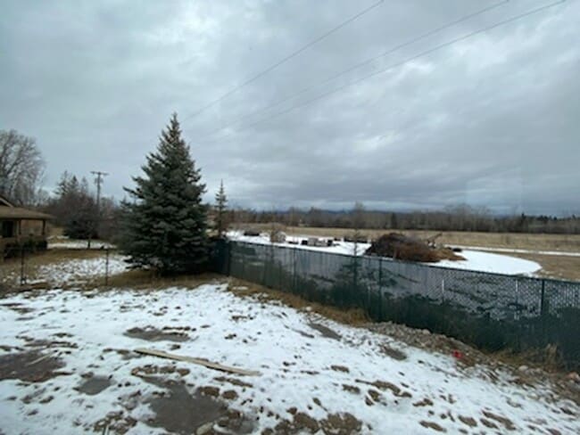 Building Photo - Swan Mountain Village Corner Lot with fenc...