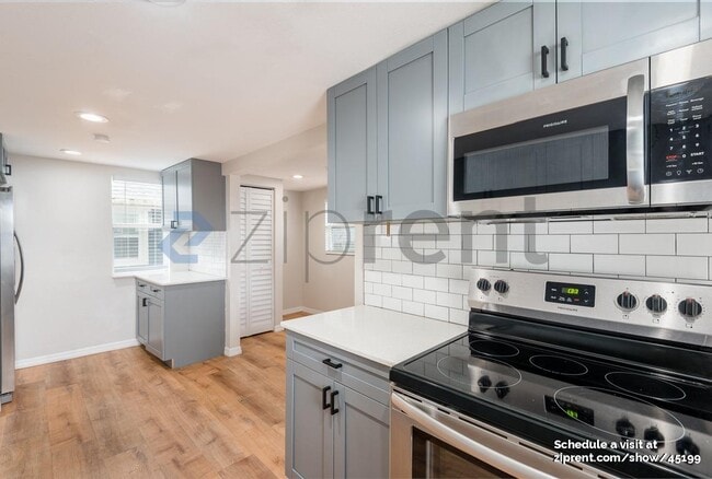Building Photo - 909 E 28th Ave