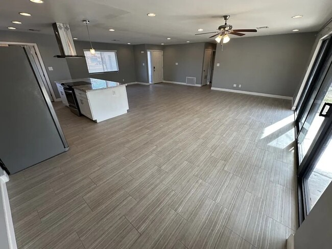 Building Photo - 8718 E Plaza Ave