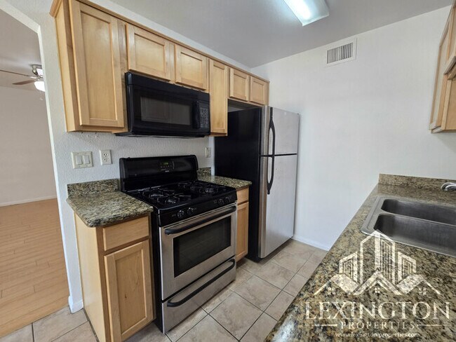 Building Photo - Fantastic, 2bd/1ba, Condo Home available in The Villaggio community, near Madison Ave. and Americ...