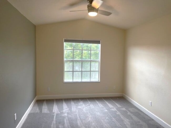 Building Photo - Stunning townhome in gated community near ...