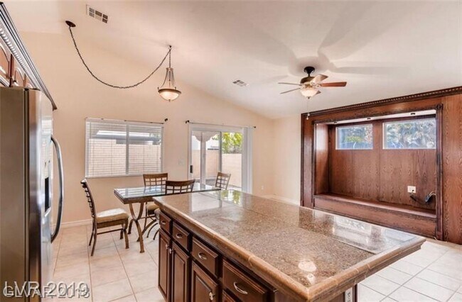 Building Photo - Renovated One Story NW Homes. Laminate Wood and Tile Flooring Throughout