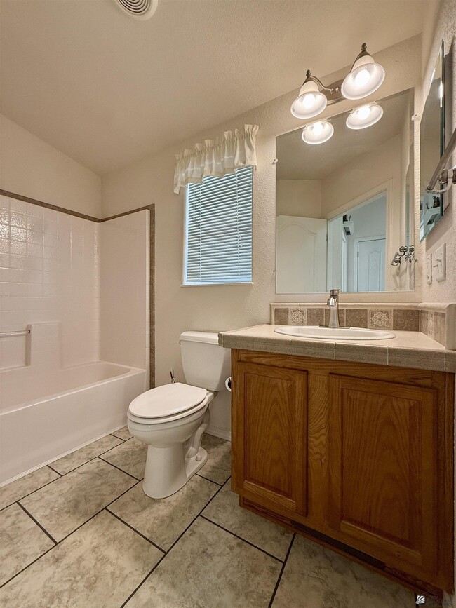 Building Photo - 13239 E 48th Dr