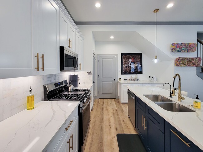 Building Photo - This 4-bedroom, 3-bathroom, two-story residence comes with a generous two-car attached garage. Re...