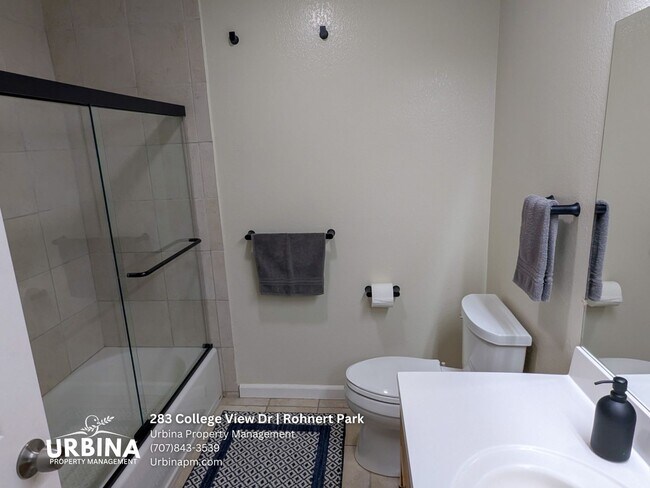 Building Photo - Two Bedroom Townhouse with Private Patio and Community Pool