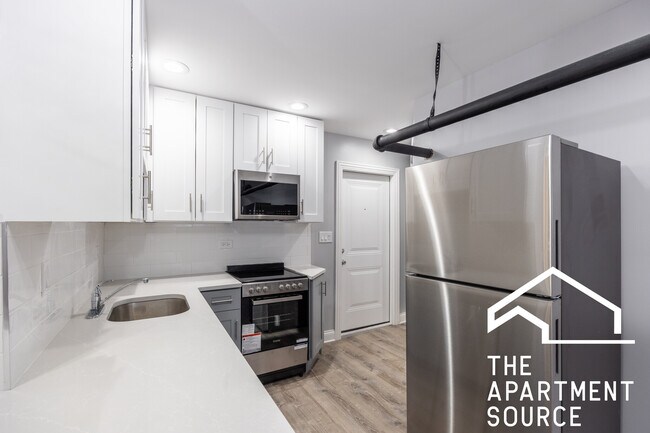 Building Photo - 1224 W Rosemont Ave