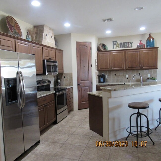 Building Photo - Beautiful Home with 57ft Boat Deep Garage!...