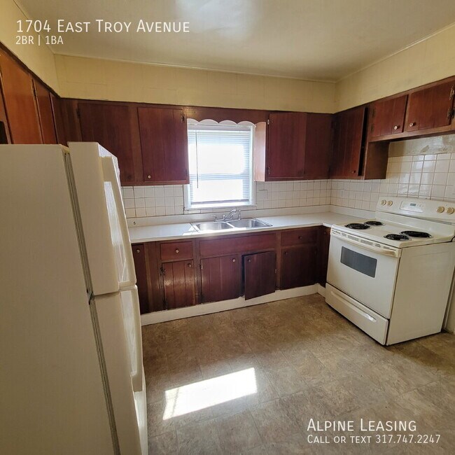 Building Photo - 1704 E Troy Ave