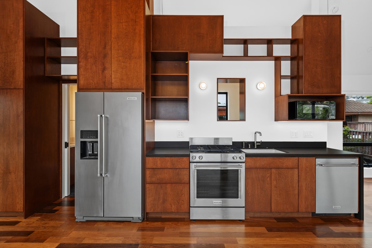 Stainless steel appliances and plenty of storage. - 4638 Del Monte Ave
