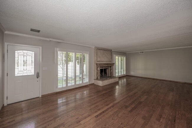 View of living room with front door on the Left - 832 Coolidge Dr