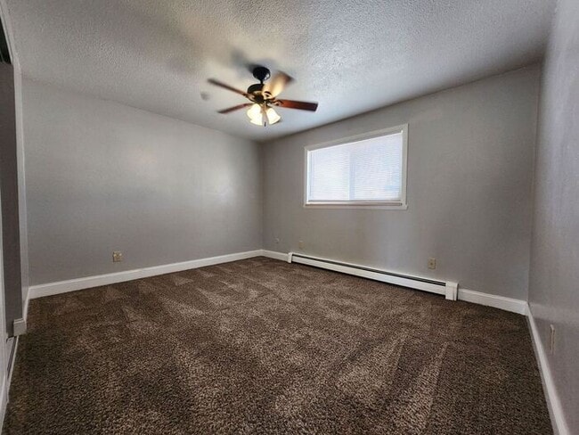 Building Photo - Cozy 2-Bed, 1-Bath Apartment – Upper Level with Covered Outdoor Space!