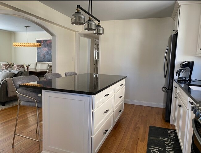 View kitchen to open concept living room & dining room - 122 Sterling Ave