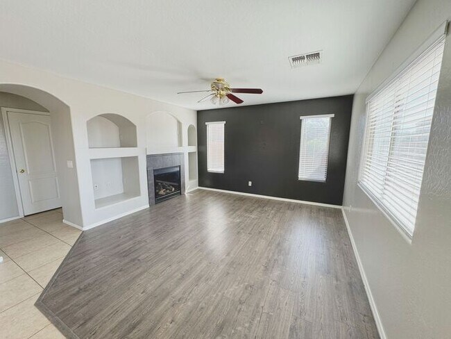 Building Photo - 4BR / 2.5BA Home with Expansive Lot – 2-Car Garage, Community Pools & Golf