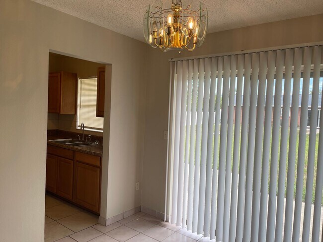 Building Photo - Adorable three bedroom two bath one car ga...