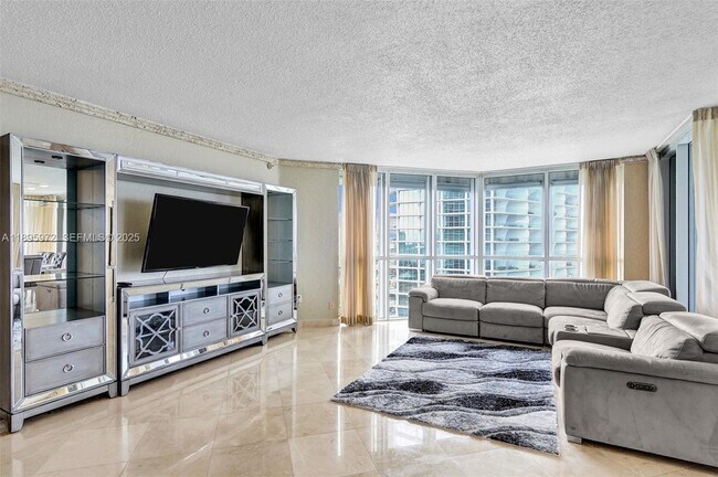 Building Photo - 16711 Collins Ave