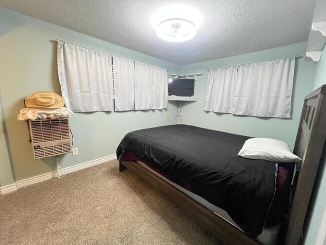 Building Photo - Pets Welcome- Charming 2-Bedroom Home with Fenced Yard in Roosevelt