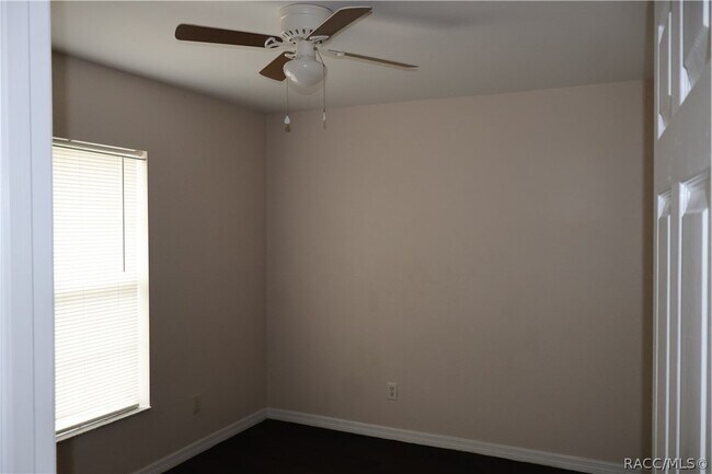 Building Photo - 9047 N Travis Dr