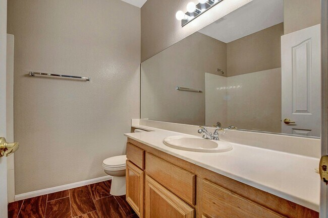 Building Photo - Gorgeous NW Single Story! 3 Car Garage! Serene Backyard.