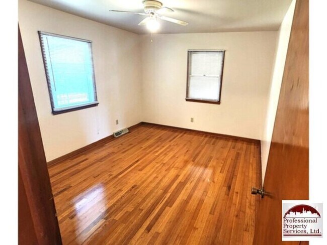 Building Photo - Charming Brick Rancher Offers A Perfect Blend Of Country Living And Convenience
