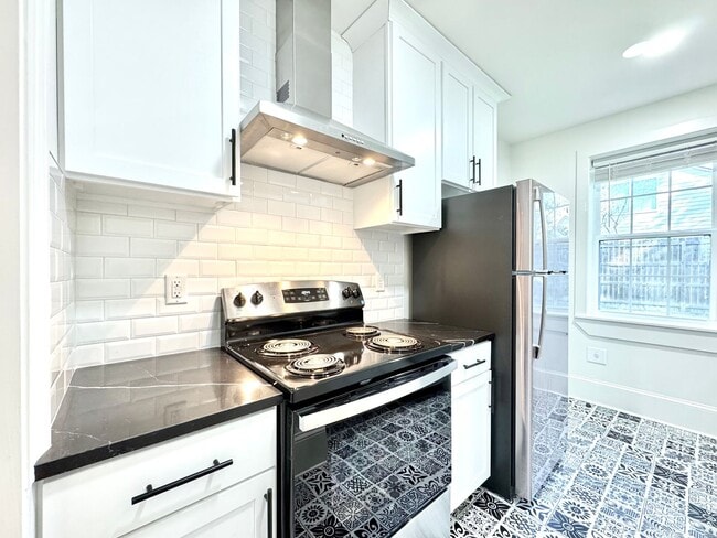 Building Photo - The Gladiola – Newly Renovated Luxury Living Near LSU Lakes