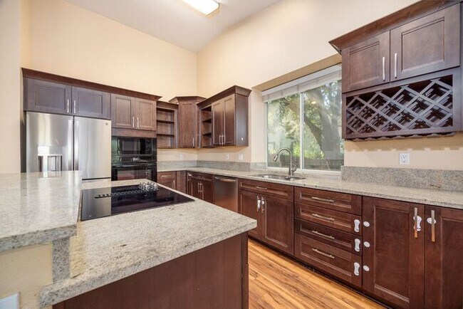 Building Photo - Welcome to this STUNNING 4-bedroom, 2.5-ba...