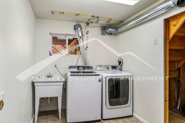 Building Photo - Spacious Home with Natural Light & Fenced Backyard