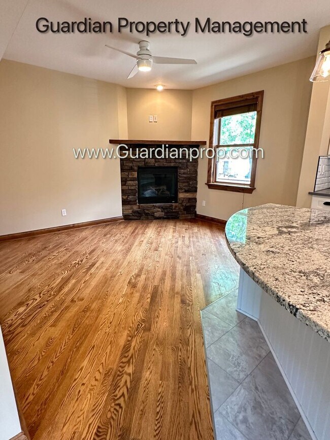 Building Photo - Downtown Hopkins SFH, Fenced Yard, Patio, Spacious Primary, 4 Car Detached Garage