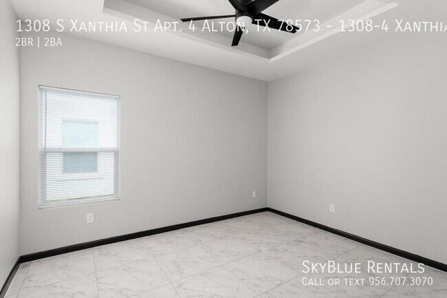Building Photo - 1308 S Xanthia St