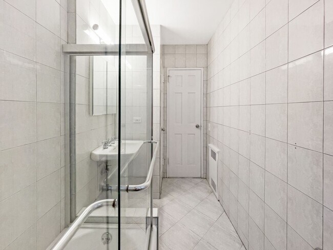 Building Photo - The Leslie — A Private Garden Enclave for the Modern New Yorker