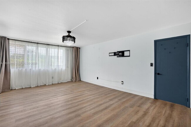 Building Photo - 10240 Collins Ave