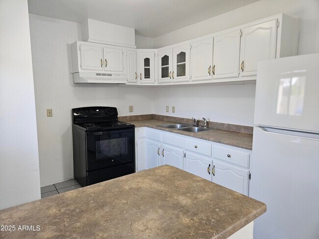 Building Photo - 8321 W Edwards St