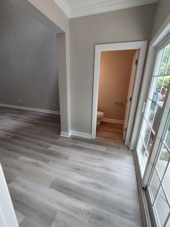 Building Photo - BRAND NEW FLOORING & FRESH PAINT - 3 Bedroom/2.5 Bath Townhome with garage in Wild Wing!