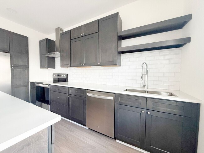 Building Photo - Spacious 4-Bedroom Townhome at Highbury + Summer Special