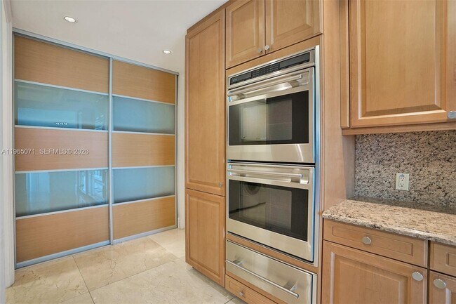 Building Photo - 10295 Collins Ave