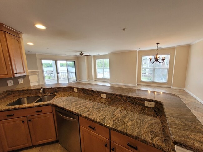 Building Photo - WATERFRONT - 3 Bed/2 Bath Condo - End Unit - Stunning View - Lake Access - Community Pool - Tenni...
