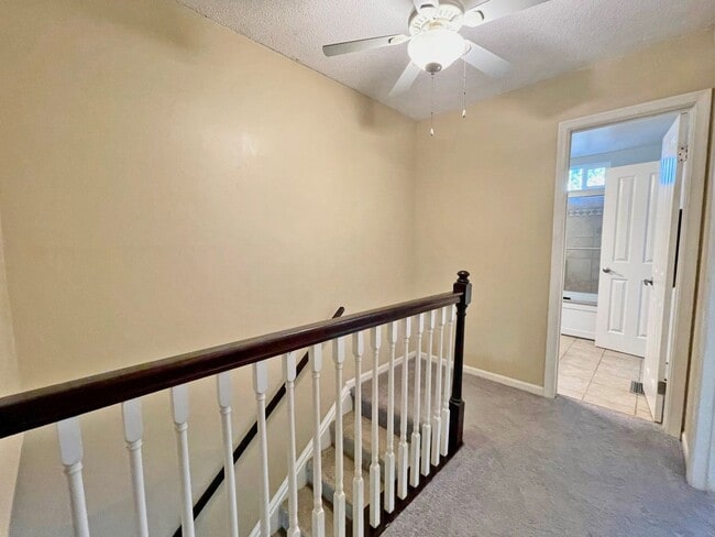 Building Photo - READY 11-07-25!! 3-Bedroom Townhome at the...
