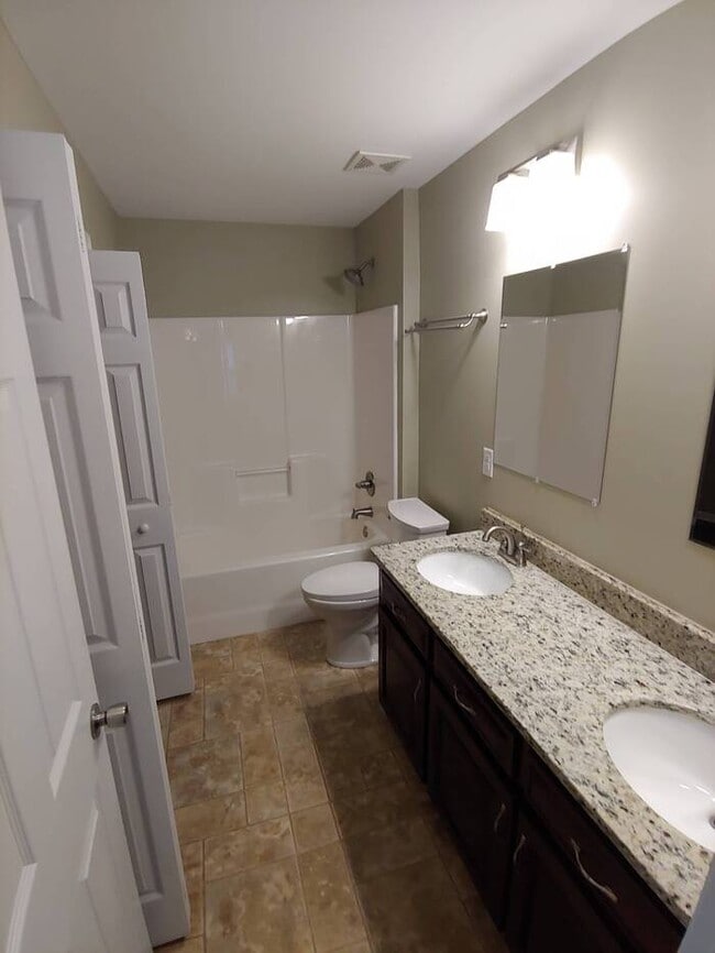 Building Photo - College students welcome