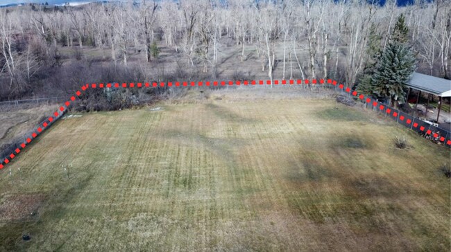 Building Photo - Spacious 4BR, 2.5BA home on 1.3 acres in Orchard Homes