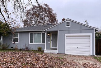 Building Photo - Bright, Updated Home with Garage, Laundry, and Private Yard