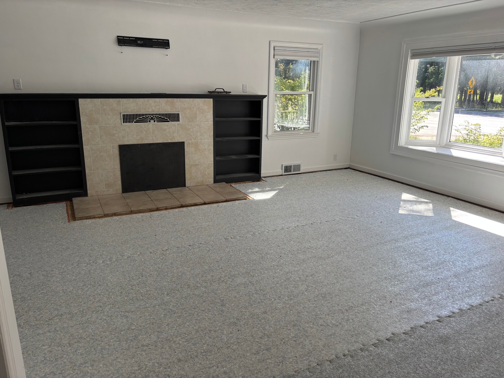 Living room. New carpet being installed now! - 917 S Division St