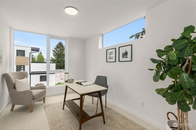 Building Photo - Welcome Home -Modern and Expansive Windows