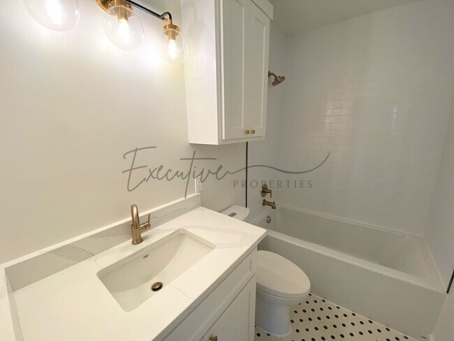 Building Photo - Spacious 4-Bedroom with Custom Finishes in...