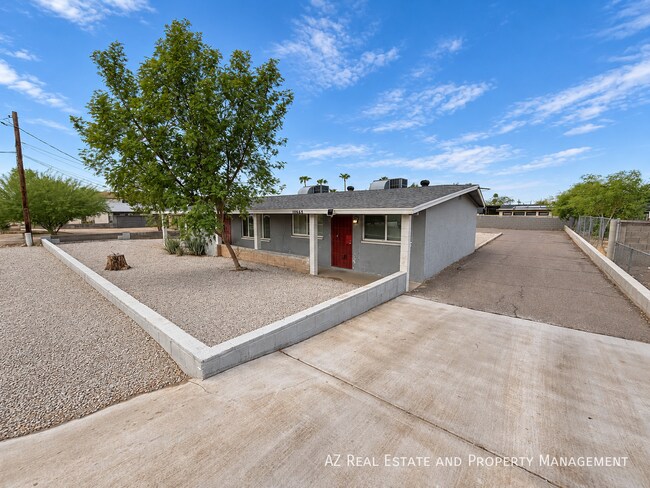 Building Photo - 10648 N 15th Ave