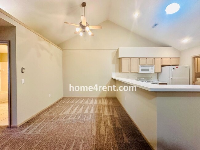 Building Photo - Maintenance FREE, Ranch Style Townhome w/ ...