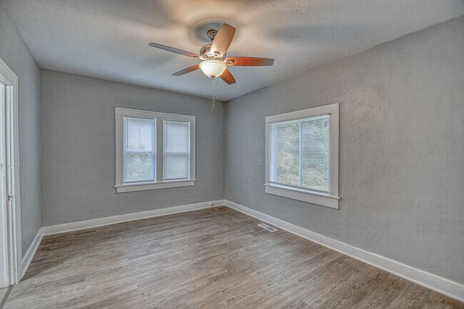 Building Photo - Newly Remodeled Campus Property! Lawn Care Included!