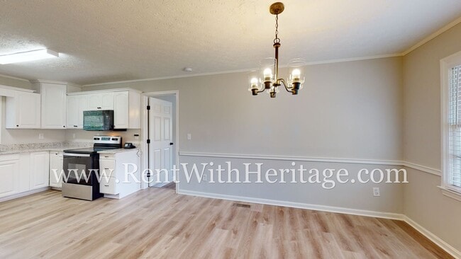 Building Photo - GORGEOUS BRICK RANCH WITH ALL THE UPGRADES...